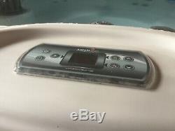 Hot tub Aspen spa 4 seat witl build in Led lights, has 4 cup holders, in grey