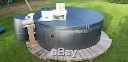 Softub hot tub. 6 person, variable jets, led colour change lights. Not used! 5k